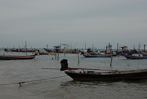 Boats on the beach at high tide